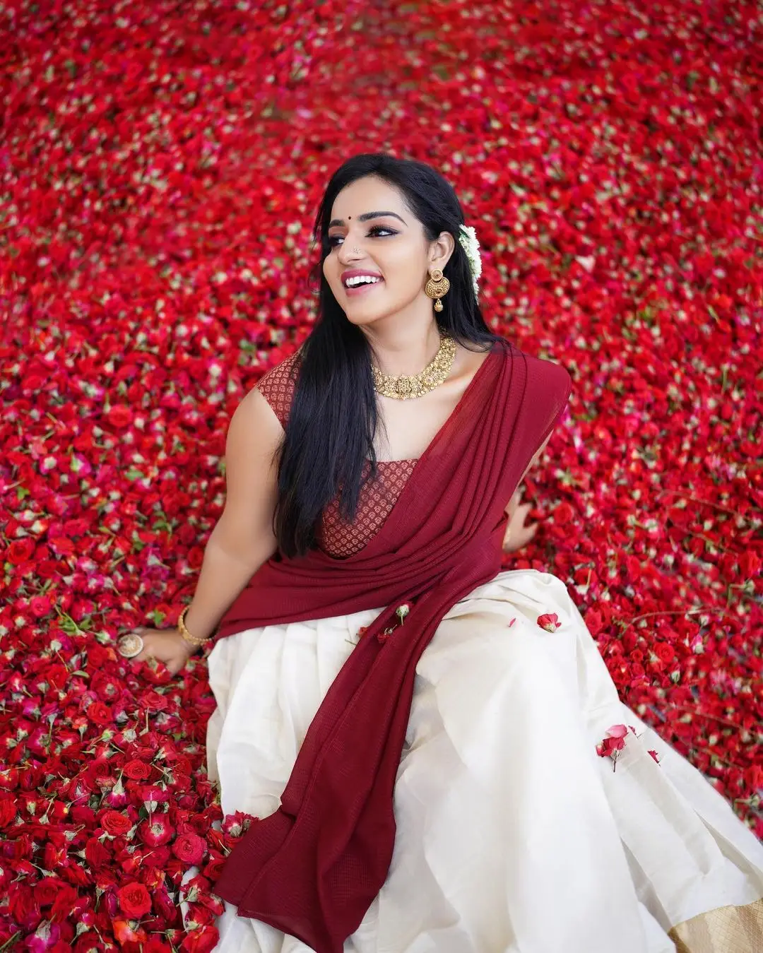 Malavika Menon In South Indian Traditional Red Half Saree Voni Blouse